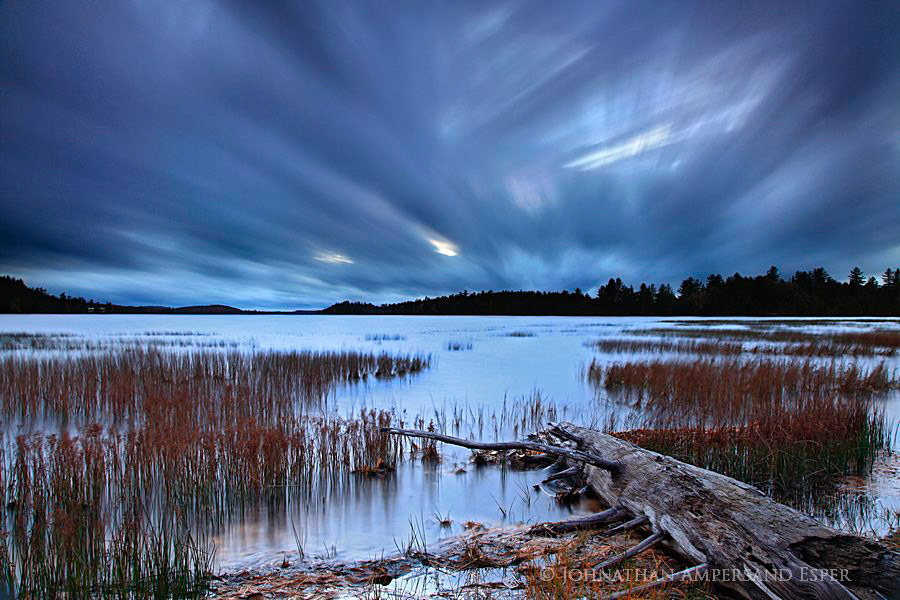 Little-Tupper-Lake-cross-streak-clouds-with-log_900px.jpg