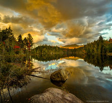 Boreas Pond stormclouds over Boreas Mt reflected in autumn