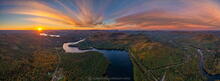 Great Sacandaga Lake from over Stewarts Bridge Resevoir late October sunset aerial panorama v1