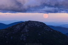 full moon rising behind Haystack Mt from Mt. Marcy