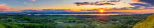 Lake Champlain and Charlotte Vermont area farms with sunset over the Adirondack Mountains range