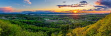 Lake Champlain and Charlotte Vermont area farms with sunset over the Adirondack Mountains range