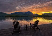 Lake Placid dock and Adirondack Chairs facing Whiteface Mt and summer solstice sunrise