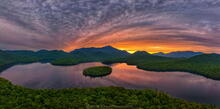Lake Placid summer solstice sunrise June 21st behind Whiteface Mt, with Hawk Island