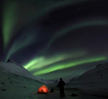 Northern Lights over tent in Iceland