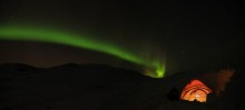 Northern Lights over tent in Norway