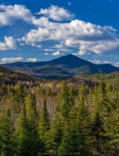 Whiteface Mt with springtime puffy clouds