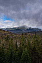 Whiteface Mt springtime rain storm over summit from Ausable River valley