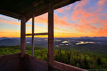 St Regis Mt Firetower cabin window view of sunrise of St Regis Lakes 