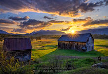 Peck family farm between Wilmington and Jay spring sunburst over Whiteface Mt