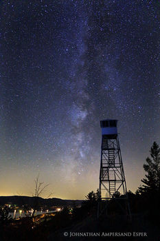 Bald-Rondaxe Mt Firetower under the Milky Way and starry night, over Second Lake