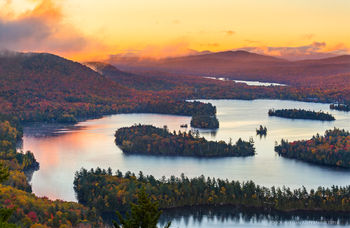Blue Mountain Lake islands orange sunrise from Castle Rock
