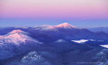 McKenzie Mt and Whiteface sunset light, winter aerial 2016