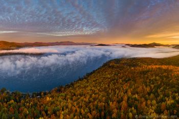 Schroon Lake morning fog with Hoffman Mt and High Peaks to the north