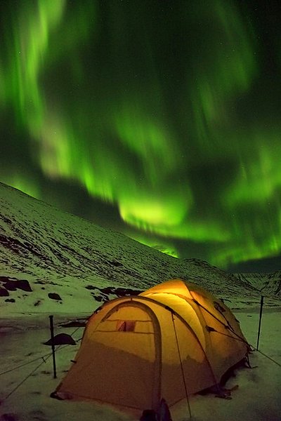 tent under the Northern Lights in Iceland