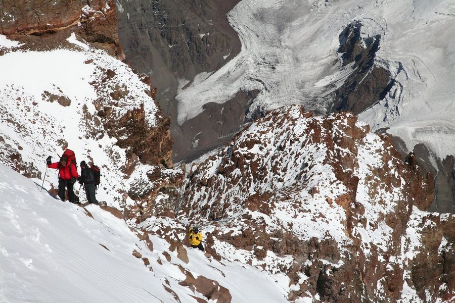 Mountaineers ascending the upper Canaleta rocky chute that leads to the summit of Aconcagua, the highest mountain in the Western...