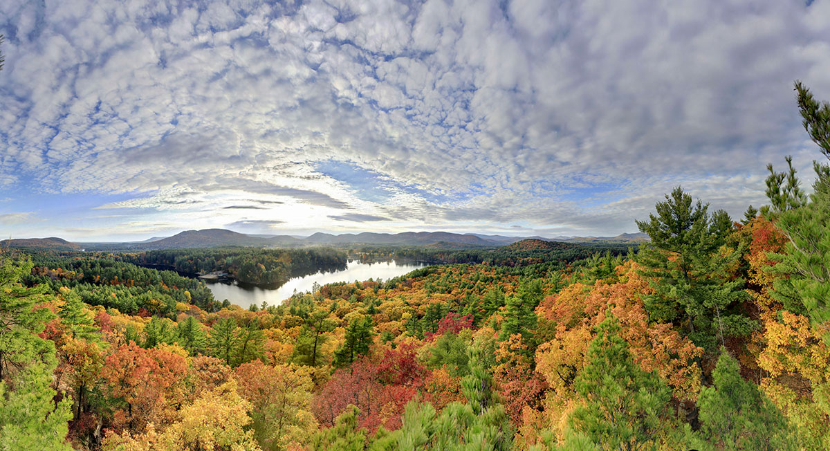 Lake Luzerne and colorful oaks 250 x 110 degree HDR panorama shot from a white pine treetop, fall 2010. Limited edition of 100...