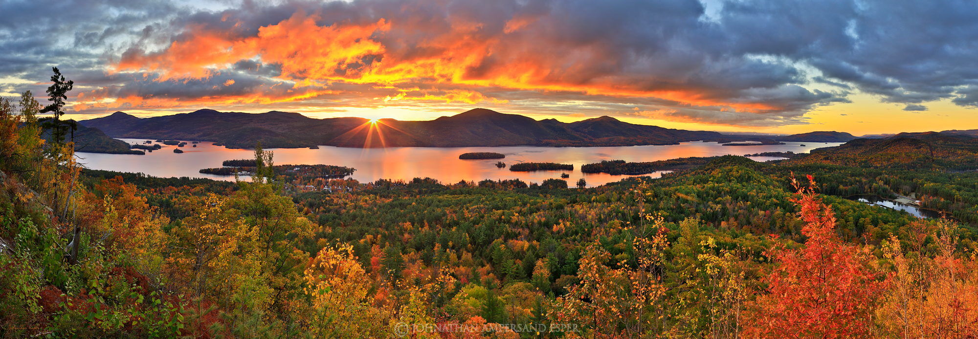 The Pinnacle over Bolton Landing village on Lake George fall sunrise. Note: This image is a cropped version of our very popular...